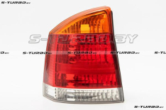 Задний фонарь (левый) с желтым поворотом