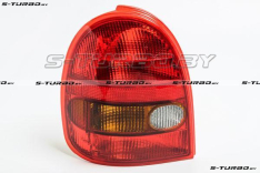 Задний фонарь (левый) красный, с желтым поворотом