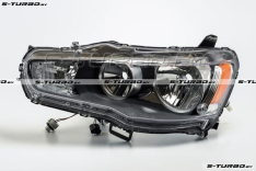 Передняя фара (левая) 2009- , темный корпус, ручная, USA-type