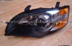 Передняя фара (левая) 2003-2008, темная, USA-type