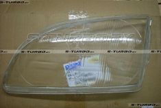 Стекло передней фары (левое)