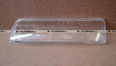 Стекло передней фары (левое)