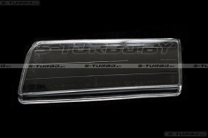 Стекло передней фары (левое)