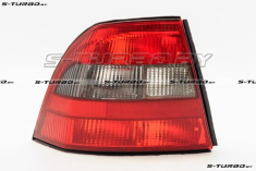 Задний фонарь (левый) с тонированным поворотом