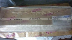 Стекло передней фары (левое)