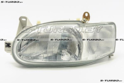 Передняя фара (левая) 1999-2000, темный корпус